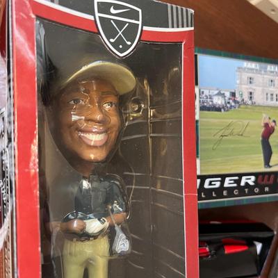 Golf Lot - Display Cabinet, Tiger Woods Collector Series Balls, etc.