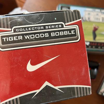 Golf Lot - Display Cabinet, Tiger Woods Collector Series Balls, etc.