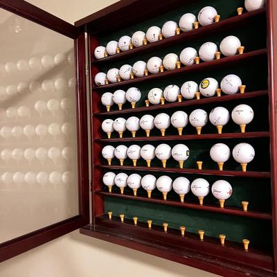 Golf Lot - Display Cabinet, Tiger Woods Collector Series Balls, etc.