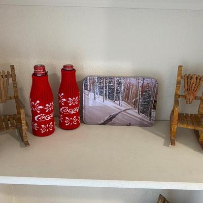 SWEATERS FOR YOUR COKE BOTTLES AND NEAT LITTLE HANDMADE ROCKING CHAIRS BUILT WITH CLOTHES PINS