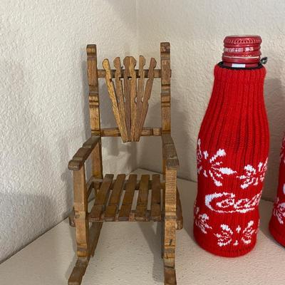 SWEATERS FOR YOUR COKE BOTTLES AND NEAT LITTLE HANDMADE ROCKING CHAIRS BUILT WITH CLOTHES PINS