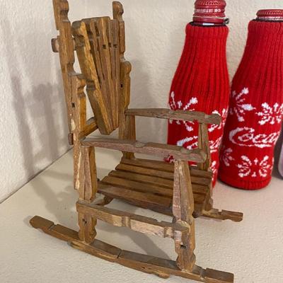 SWEATERS FOR YOUR COKE BOTTLES AND NEAT LITTLE HANDMADE ROCKING CHAIRS BUILT WITH CLOTHES PINS