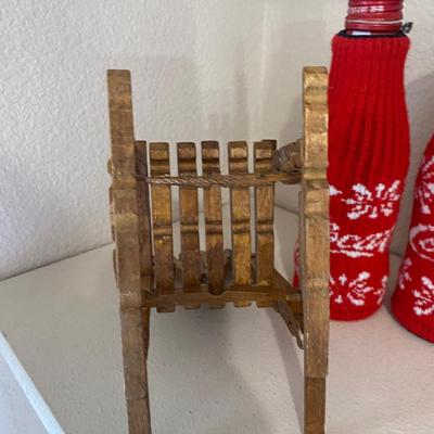 SWEATERS FOR YOUR COKE BOTTLES AND NEAT LITTLE HANDMADE ROCKING CHAIRS BUILT WITH CLOTHES PINS