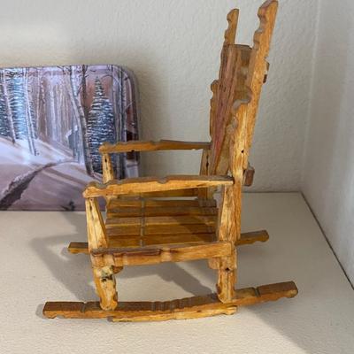 SWEATERS FOR YOUR COKE BOTTLES AND NEAT LITTLE HANDMADE ROCKING CHAIRS BUILT WITH CLOTHES PINS
