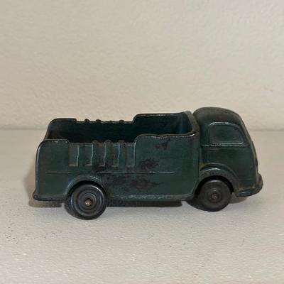 1937 AUBURN RUBBER CABOVER STAKE TRUCK & PLASTIC TRUCK W/TRAILER