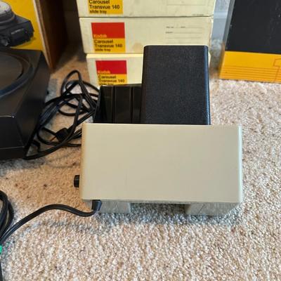 ARGUS 693 ELECTROMATIC SLIDE PROJECTOR W/VARIOUS SLIDES PLUS A PROJECTOR SCREEN