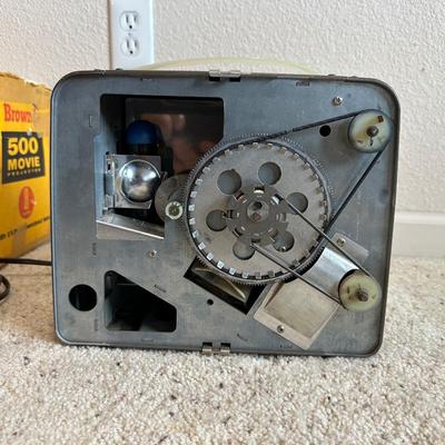 KODAK BROWNIE 500 MOVIE PROJECTOR SUPER 8 W/VARIOUS MOVIES PLUS A PROJECTOR SCREEN