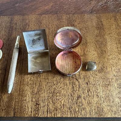 2 PILL CASES, CHIPS, HEART LOCKET AND A PEN
