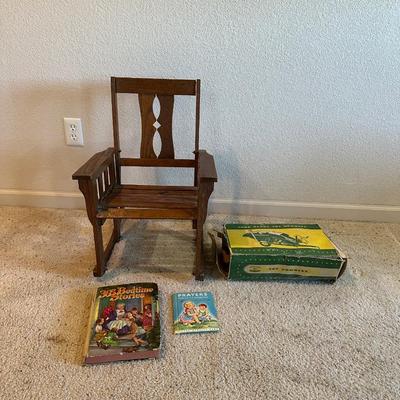CHILD'S ROCKING CHAIR, EMPTY BOX FOR JOHN DEERE TOY COMBINE AND 1944 BEDTIME STORIES