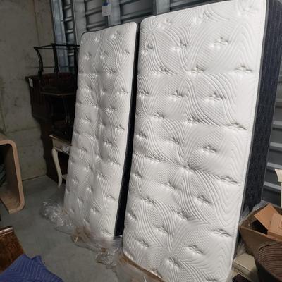 Two Twin Metal Bedframes and Mattresses (1020B-KD)