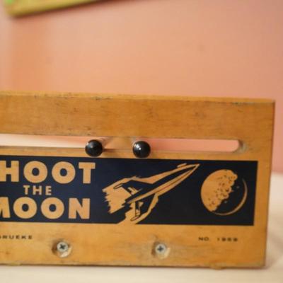 Sale Photo Thumbnail #119: Vintage 1959 Shoot the Moon game by Drueke. A skill and action game that can be played with just one player. Original condition with one steel ball. - 7.5 W x 18.5 D x 4 H.