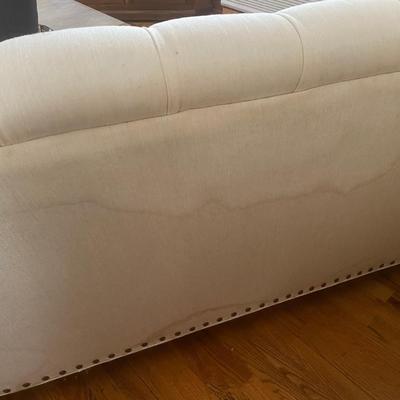 Dwellings White Tufted Sofa and Matching Swivel Armchair