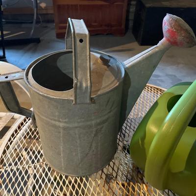 3 watering cans