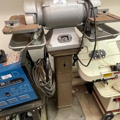 Double bench electric grinder on Baldor pedestal base