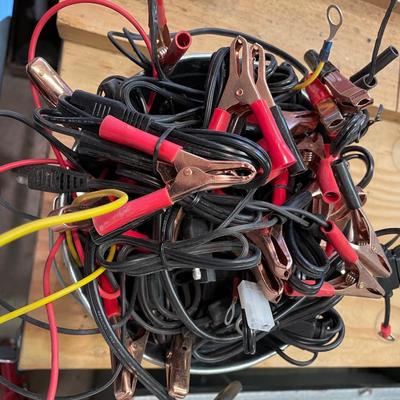 Bucket of battery clip on cables