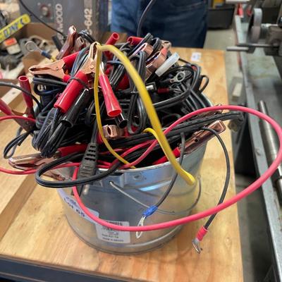 Bucket of battery clip on cables