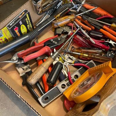 Box of misc. hand tools-pliers/hand saw/flex flashlight/level/tin snips & more