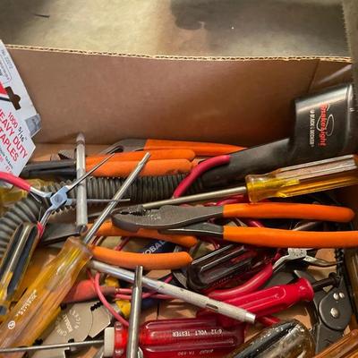 Box of misc. hand tools-pliers/hand saw/flex flashlight/level/tin snips & more