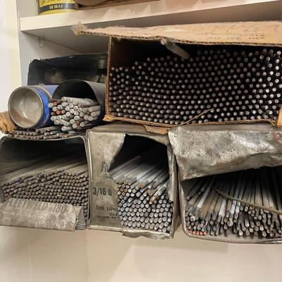 3 Shelves of Welding Supplies - Lots of Welding Rods & More