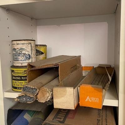 3 Shelves of Welding Supplies - Lots of Welding Rods & More