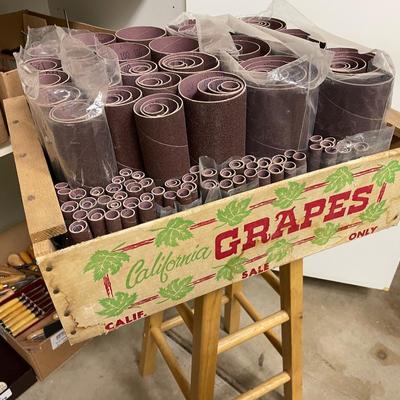 Wood Grape Crate of sanding paper rolls/tubes