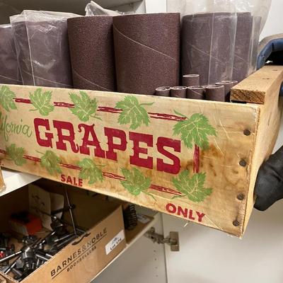 Wood Grape Crate of sanding paper rolls/tubes