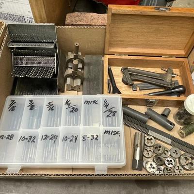 Flat Box full of very small drill bits/threading tools