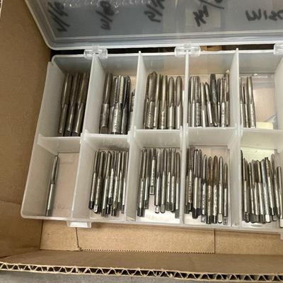 Flat Box full of very small drill bits/threading tools