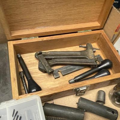 Flat Box full of very small drill bits/threading tools