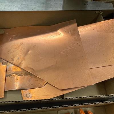Box of flat copper flashing pieces