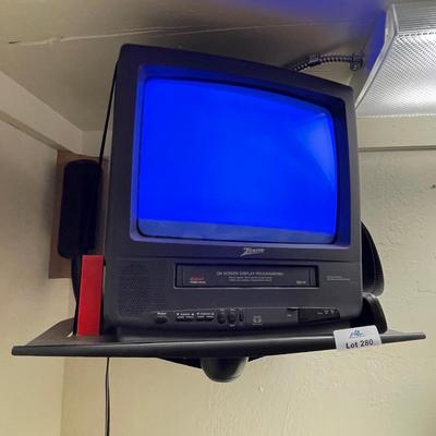 Sale Photo Thumbnail #1049: will need to remove from wall - VCR is working & has remote