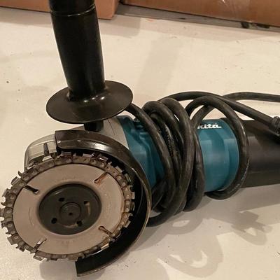 Makita electric Model 9564CV Angle Grinder