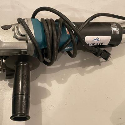 Makita electric Model 9564CV Angle Grinder