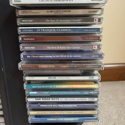 LOT 5B: Large Collection of CDs w/ Rotating CD Rack