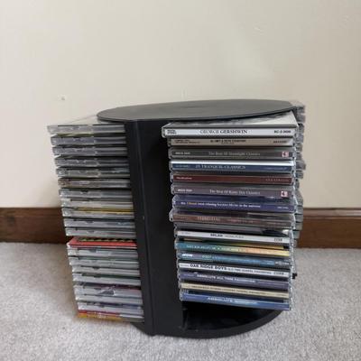 LOT 5B: Large Collection of CDs w/ Rotating CD Rack