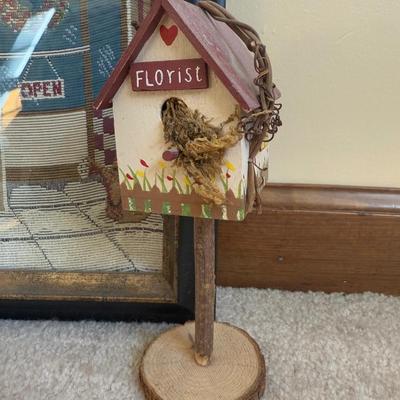 LOT 21B: Charlene Olson Embroidered Artwork, Florist Village House, Wreath in Box & More