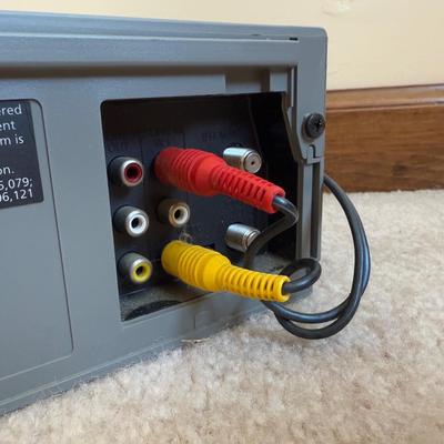 LOT 29B: RCA VCR Model No VR651HF w/ Collection of Disney VHS Tapes