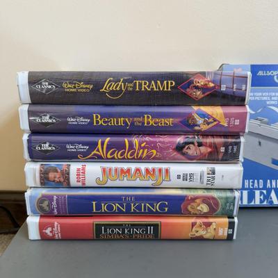 LOT 29B: RCA VCR Model No VR651HF w/ Collection of Disney VHS Tapes