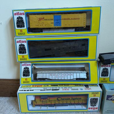 LOT 36B: Atlas HO Train Cars in Boxes, Throttlepack Model 501 Transformer w/ Box & More