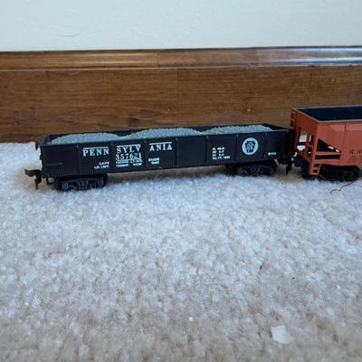 LOT 36B: Atlas HO Train Cars in Boxes, Throttlepack Model 501 Transformer w/ Box & More