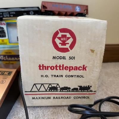 LOT 36B: Atlas HO Train Cars in Boxes, Throttlepack Model 501 Transformer w/ Box & More