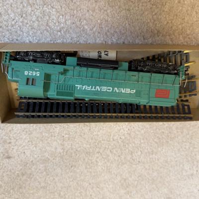 LOT 36B: Atlas HO Train Cars in Boxes, Throttlepack Model 501 Transformer w/ Box & More