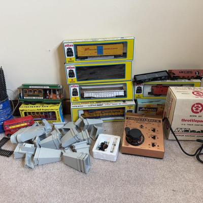 LOT 36B: Atlas HO Train Cars in Boxes, Throttlepack Model 501 Transformer w/ Box & More