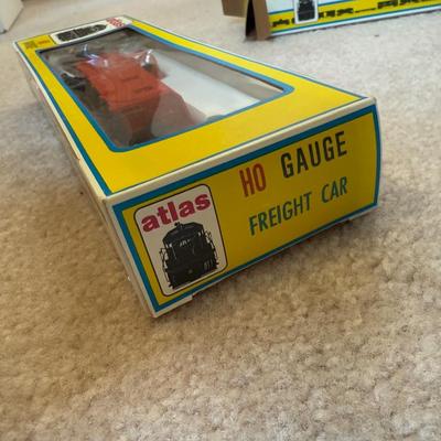 LOT 36B: Atlas HO Train Cars in Boxes, Throttlepack Model 501 Transformer w/ Box & More