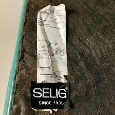 LOT 46 Z: Selig Green Leather Oversized Chair, Ottoman, & Pillow