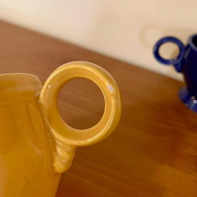 LOT 60 K: Fiestaware Collection: Plates, Salt & Pepper Shakers, Cups, & More