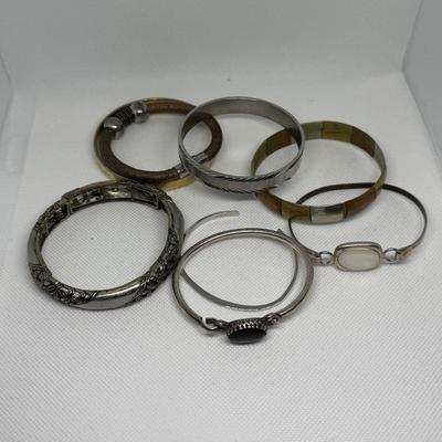 LOT 121J: Collection of Cuff & Bangle Bracelets - Avon & More