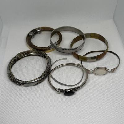 LOT 121J: Collection of Cuff & Bangle Bracelets - Avon & More
