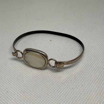 LOT 121J: Collection of Cuff & Bangle Bracelets - Avon & More