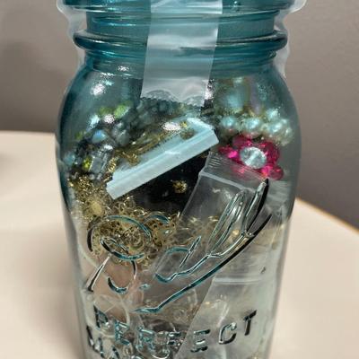 Blue Ball jar filled with crafting jewelry